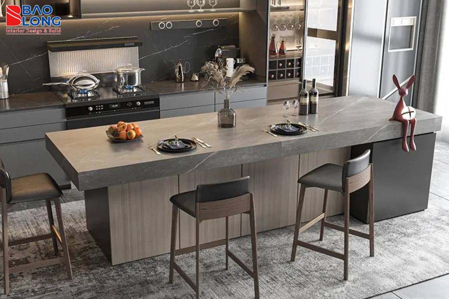 Không gian bếp mở với bàn đảo liên thông bàn ăn